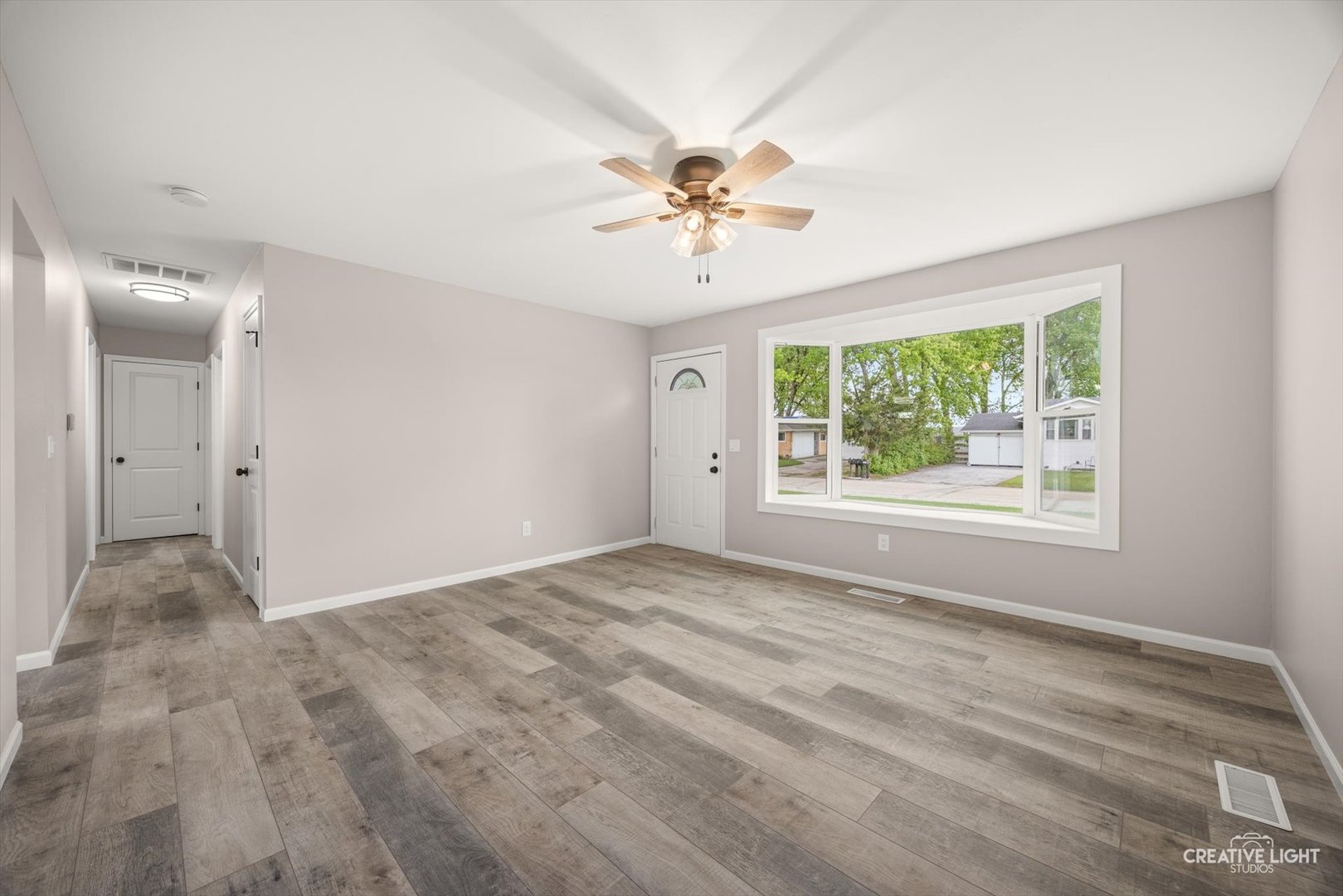 286 South Barbara Drive Kankakee, IL 60901 - Photo 9 of 18 a view of an empty room with a window