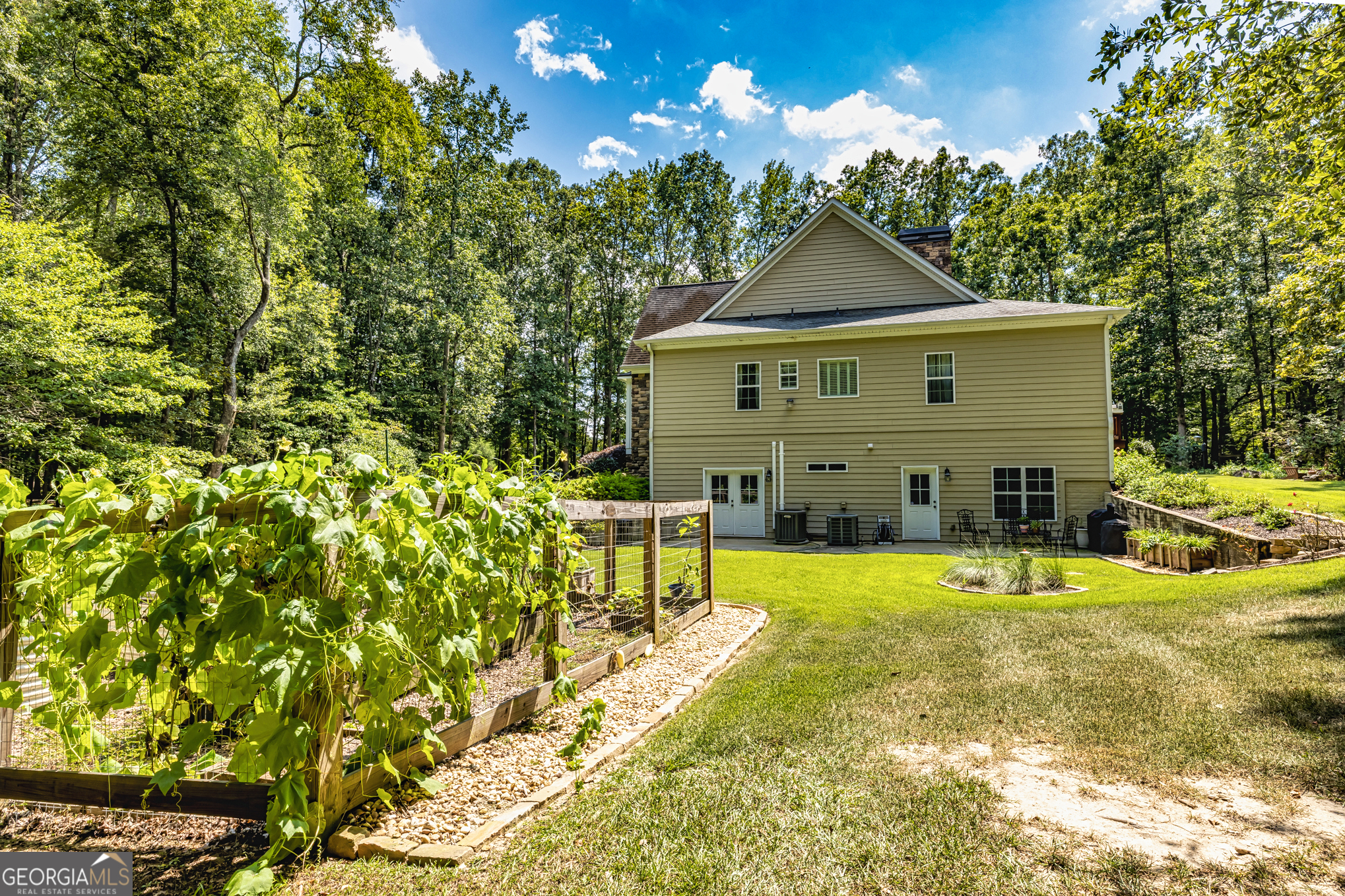 210 Mockingbird Lane Brooks, GA 30205 - Photo 53 of 87 a view of a house with pool and a yard