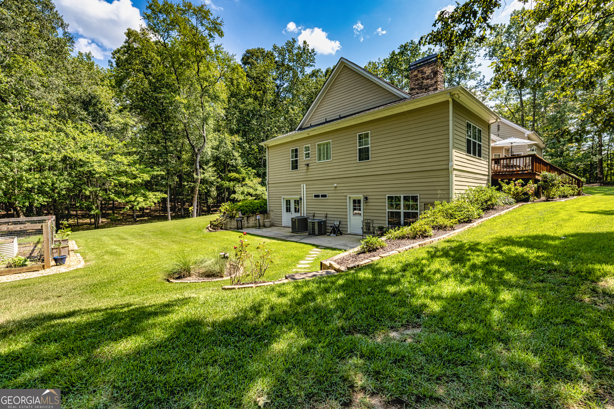 210 Mockingbird Lane Brooks, GA 30205 - Photo 54 of 87 a view of a house with a yard