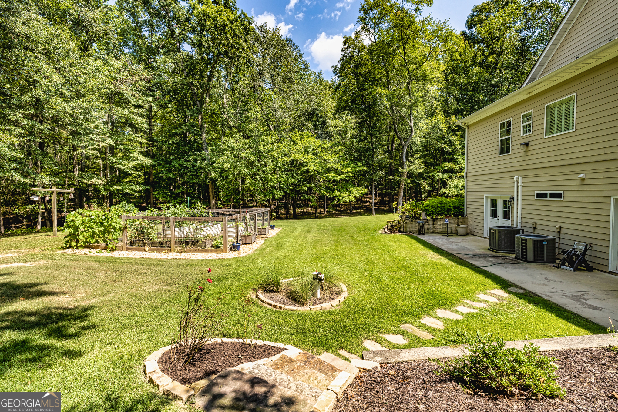 210 Mockingbird Lane Brooks, GA 30205 - Photo 55 of 87 a view of a swimming pool with an outdoor seating and yard