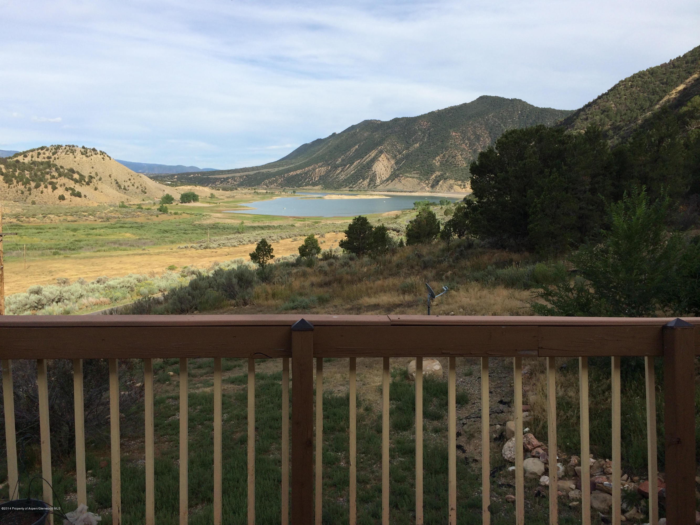 1000 County Road 252 Rifle, CO 81650 - Photo 22 of 22 a view of a lake with a mountain