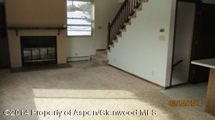 1000 County Road 252 Rifle, CO 81650 - Photo 5 of 22 a view of an entryway with a fireplace