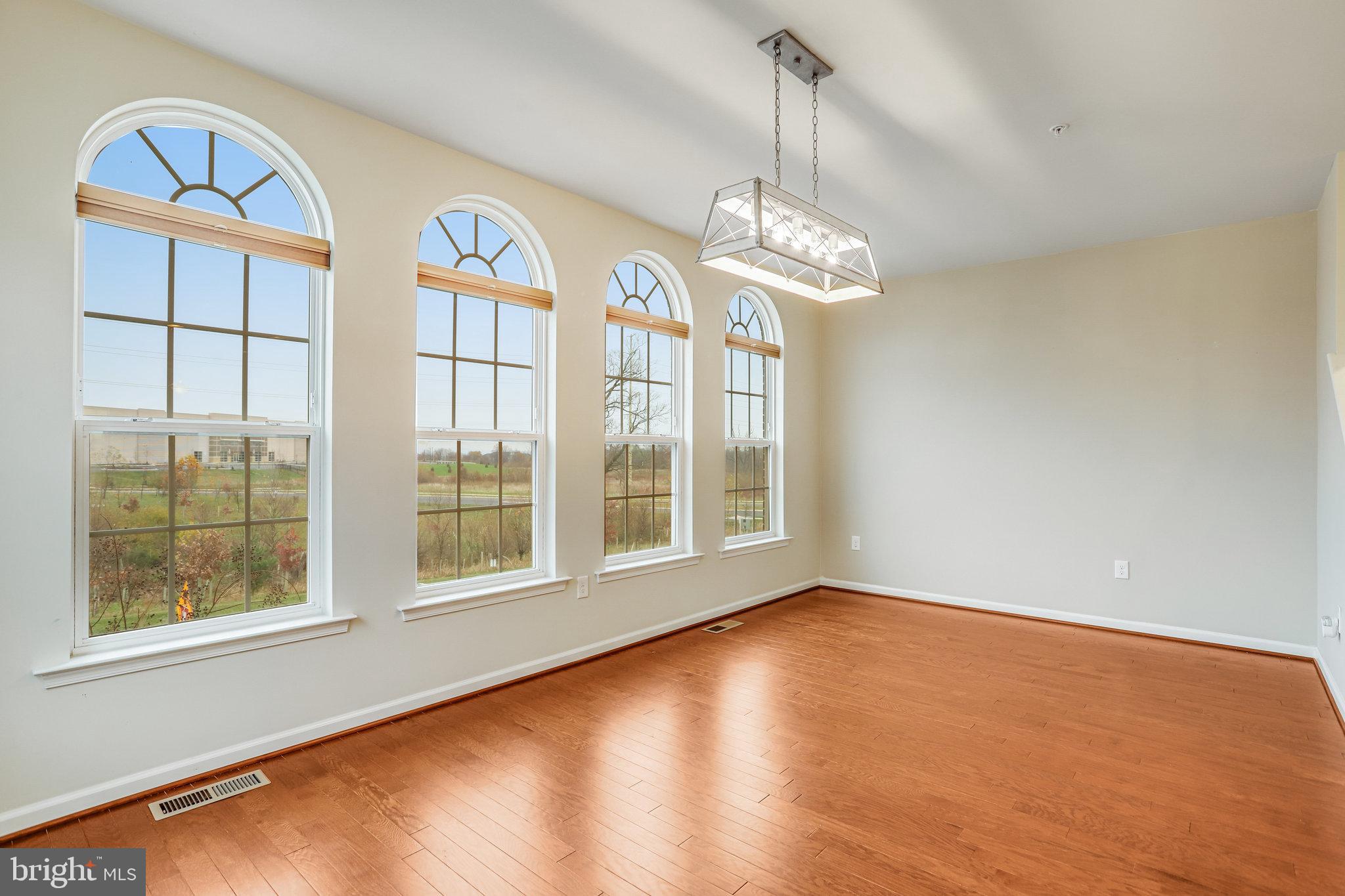 5918 Jefferson Commons Way Frederick, MD 21703 - Photo 17 of 39 a view of livingroom with window