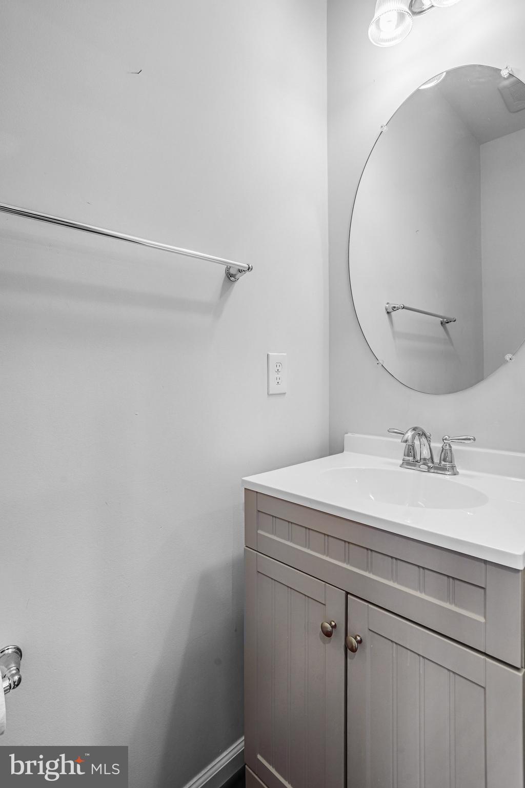 5918 Jefferson Commons Way Frederick, MD 21703 - Photo 21 of 39 a bathroom with a sink and a mirror