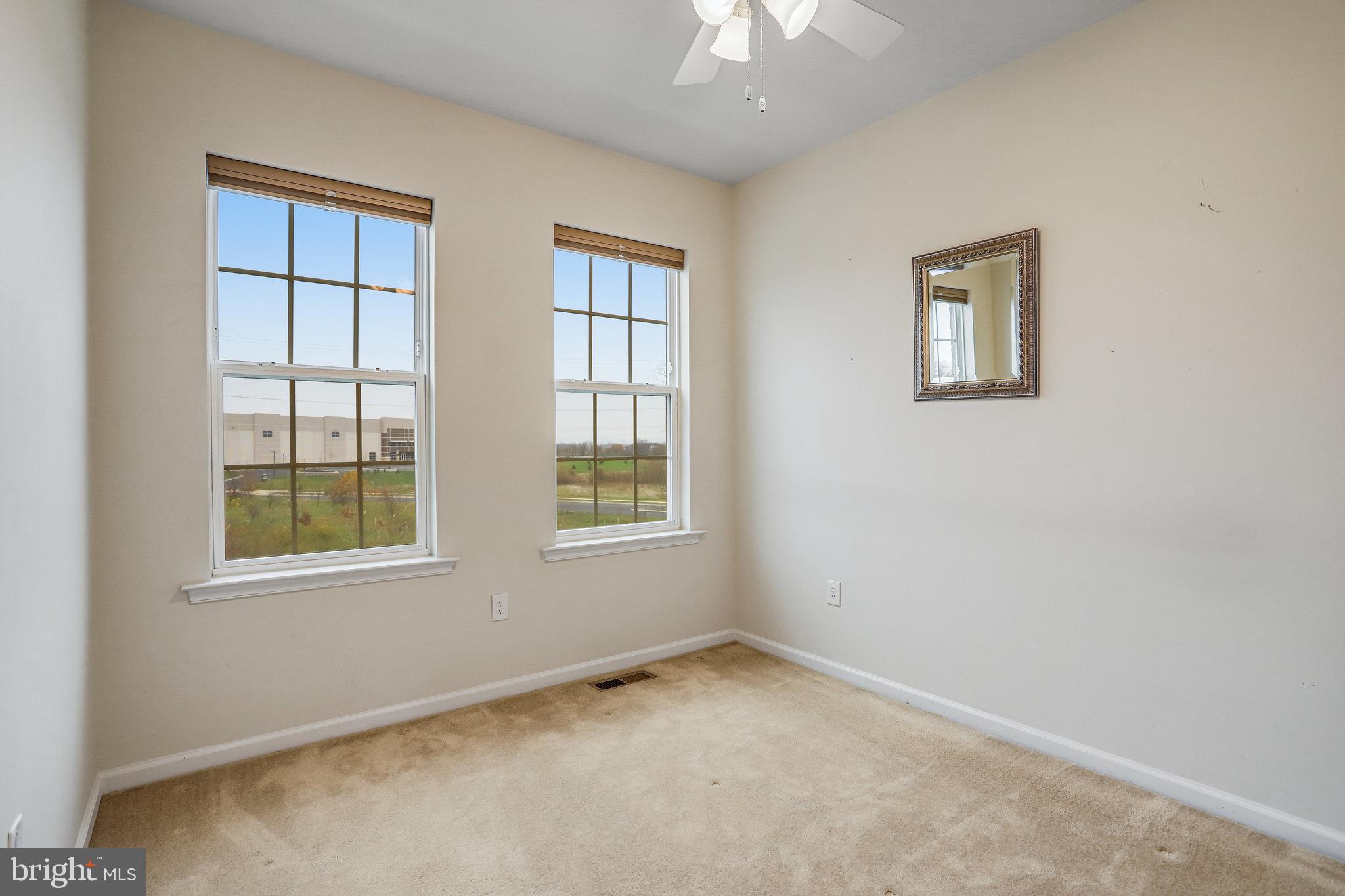5918 Jefferson Commons Way Frederick, MD 21703 - Photo 29 of 39 an empty room with a window