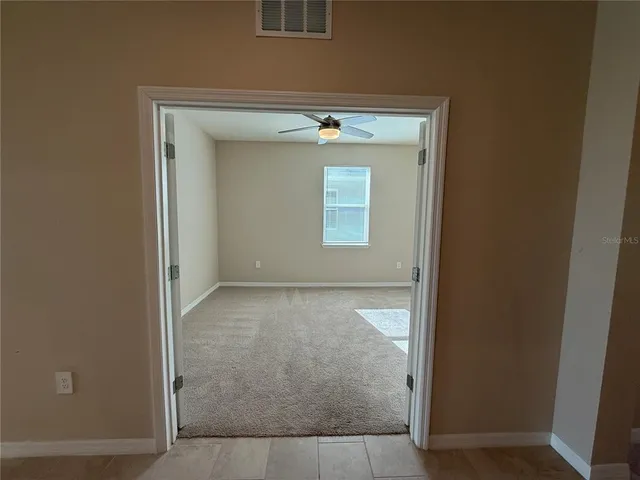 an empty room with windows