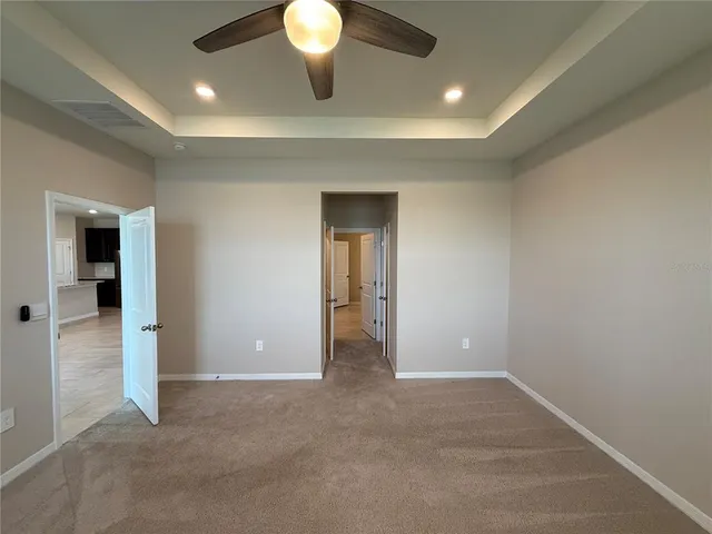 a bathroom with a double vanity sink and mirror