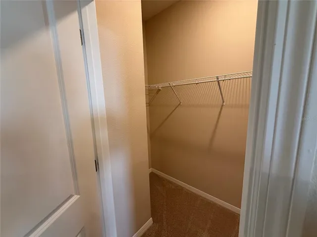 a view of lake with mountain in background