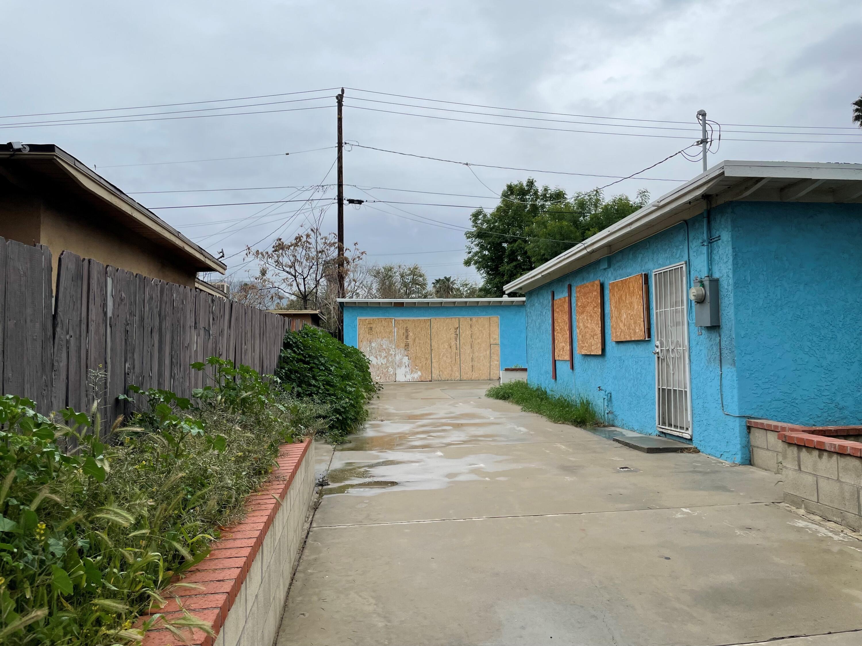 382 Iowa Avenue Riverside, CA 92507 - Photo 16 of 26 a front view of a house with garden