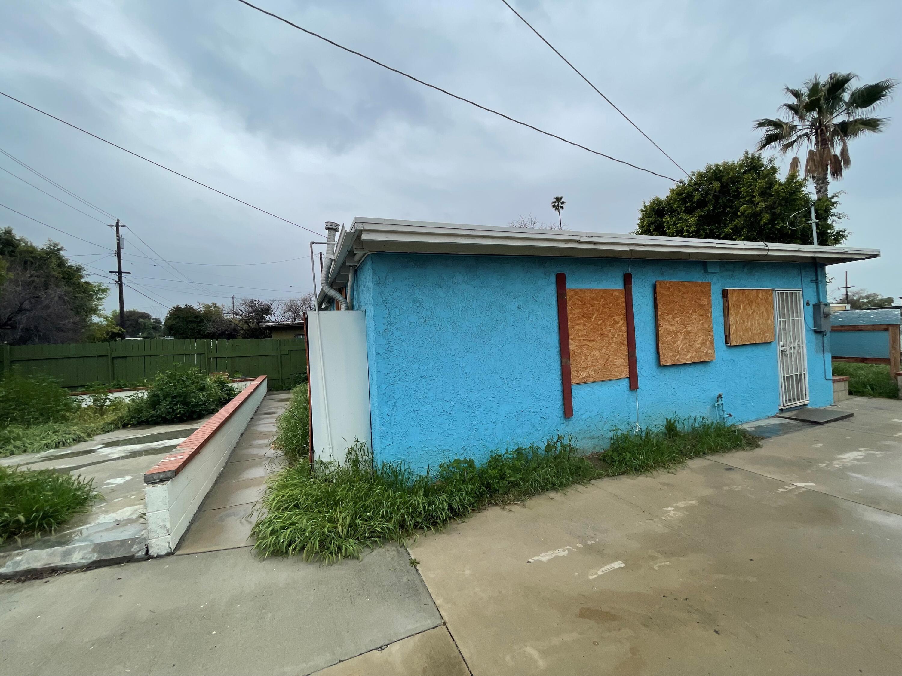 382 Iowa Avenue Riverside, CA 92507 - Photo 19 of 26 a front view of a house with garden