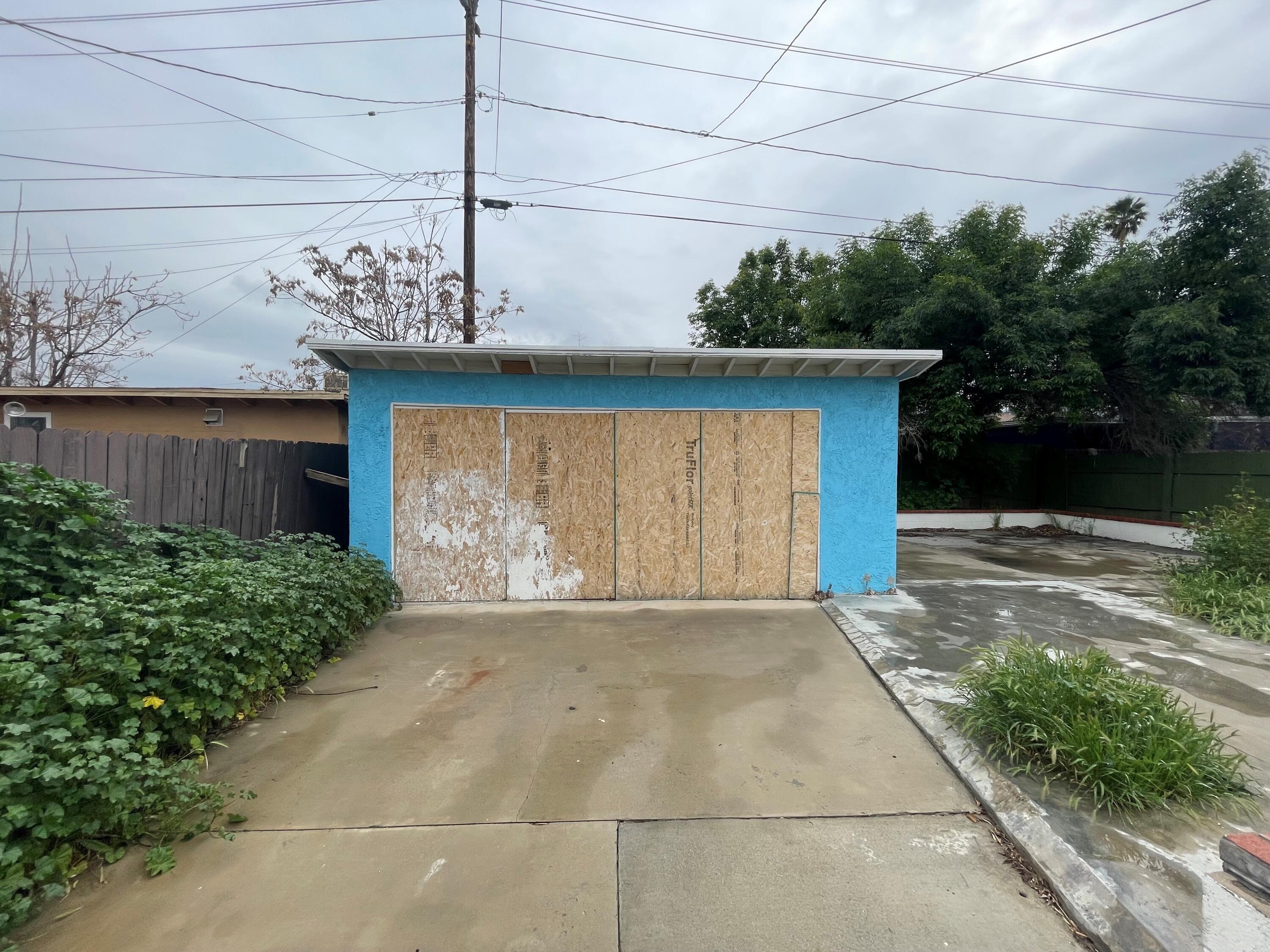 382 Iowa Avenue Riverside, CA 92507 - Photo 20 of 26 a front view of a house having yard