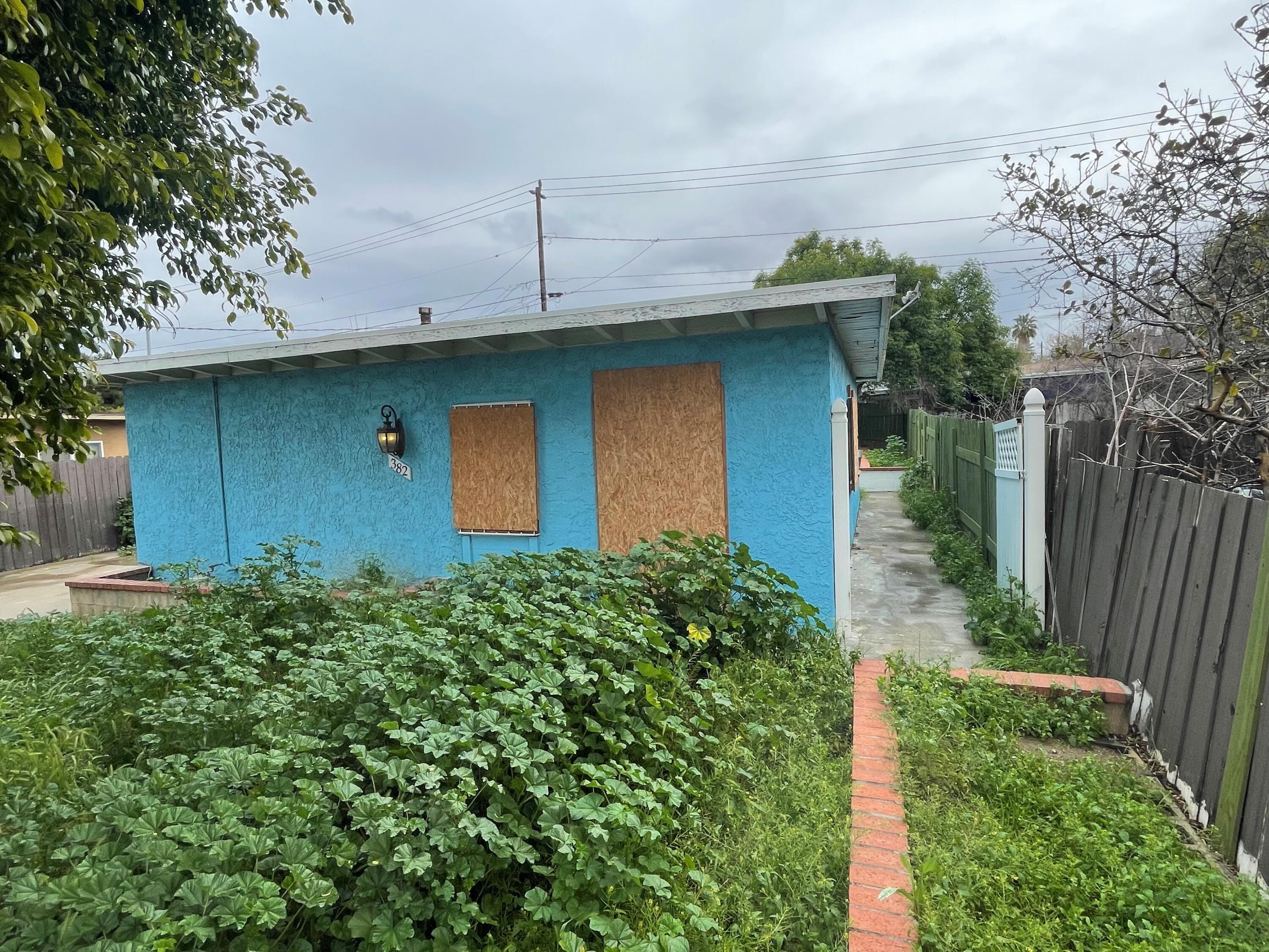 382 Iowa Avenue Riverside, CA 92507 - Photo 26 of 26 a front view of a house with garden