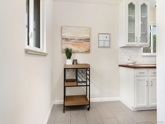 a view of kitchen and windows