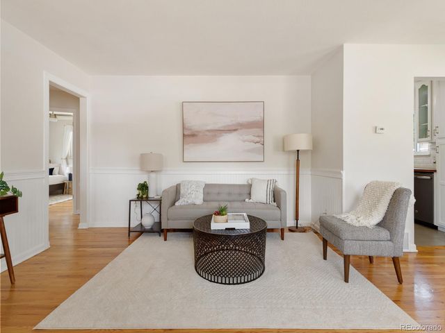 a living room with furniture and a couch
