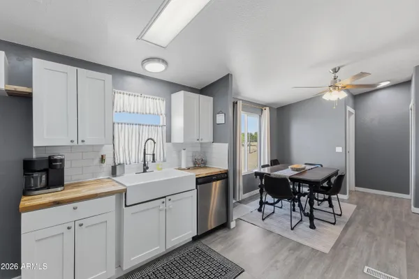 a livingroom with furniture and wooden floor