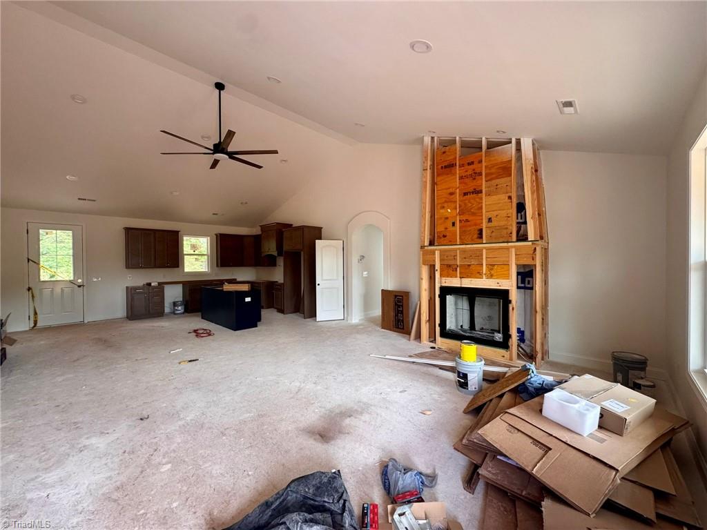 266 Mt Zion Church Road Stokesdale, NC 27357 - Photo 5 of 29 open concept living with vaulted ceilings and recess lighting
