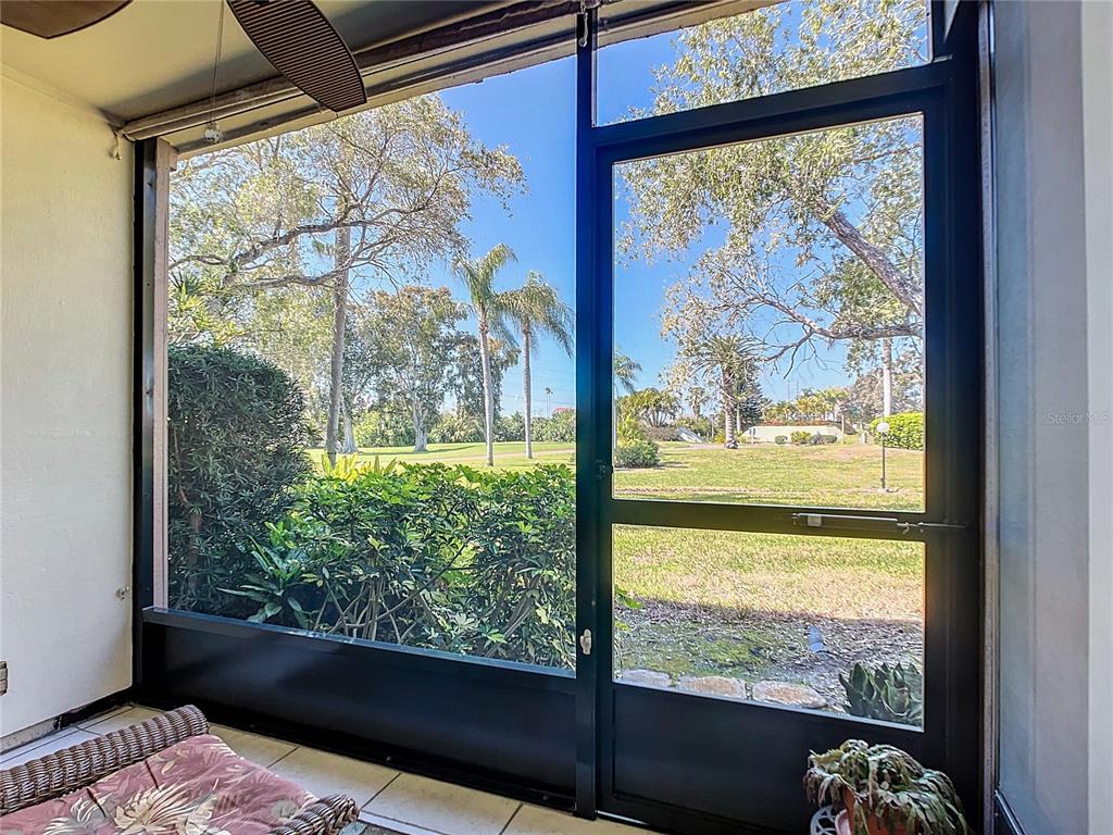 a view of a glass door with a outdoor space