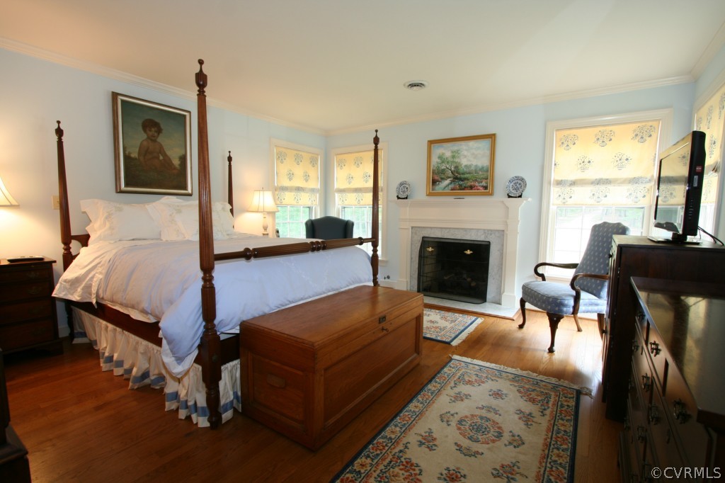 1624 Shallow Well Road Manakin-Sabot, VA 23103 - Photo 15 of 24 a bedroom with furniture and a fireplace