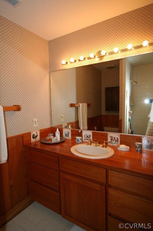 1624 Shallow Well Road Manakin-Sabot, VA 23103 - Photo 19 of 24 a bathroom with a sink and a mirror