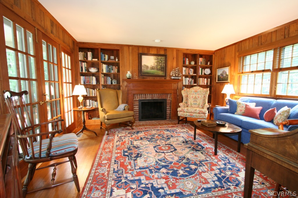 1624 Shallow Well Road Manakin-Sabot, VA 23103 - Photo 7 of 24 a living room with furniture a rug and a fireplace