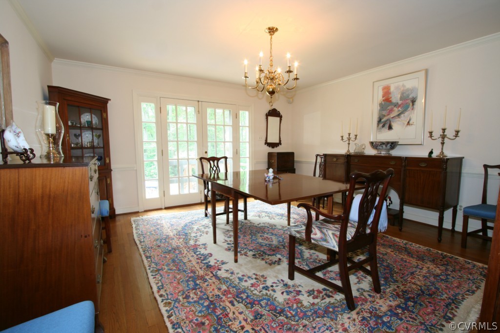 1624 Shallow Well Road Manakin-Sabot, VA 23103 - Photo 9 of 24 a view of a dining room with furniture window and wooden floor