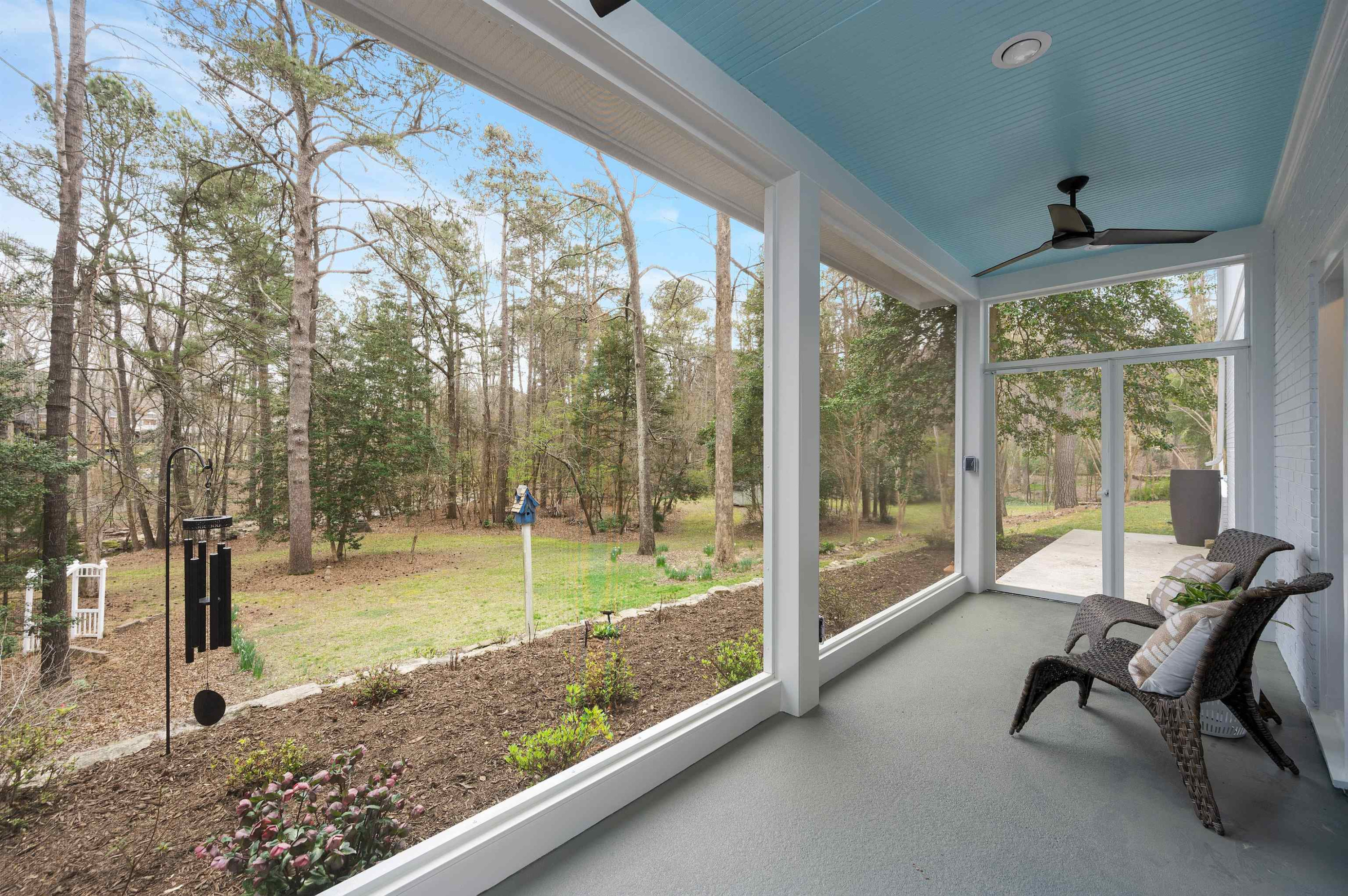 4907 Rembert Drive Raleigh, NC 27612 - Photo 34 of 52 The screened porch off the bonus room is the perfect spot to take in the views and sounds of this incredible lot with the creek down below Screened Porch