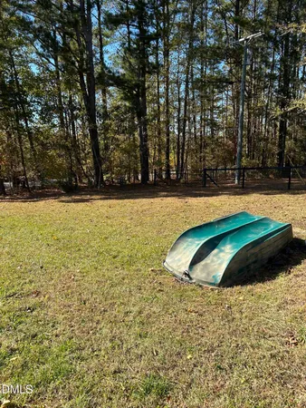 a view of a pool in a yard