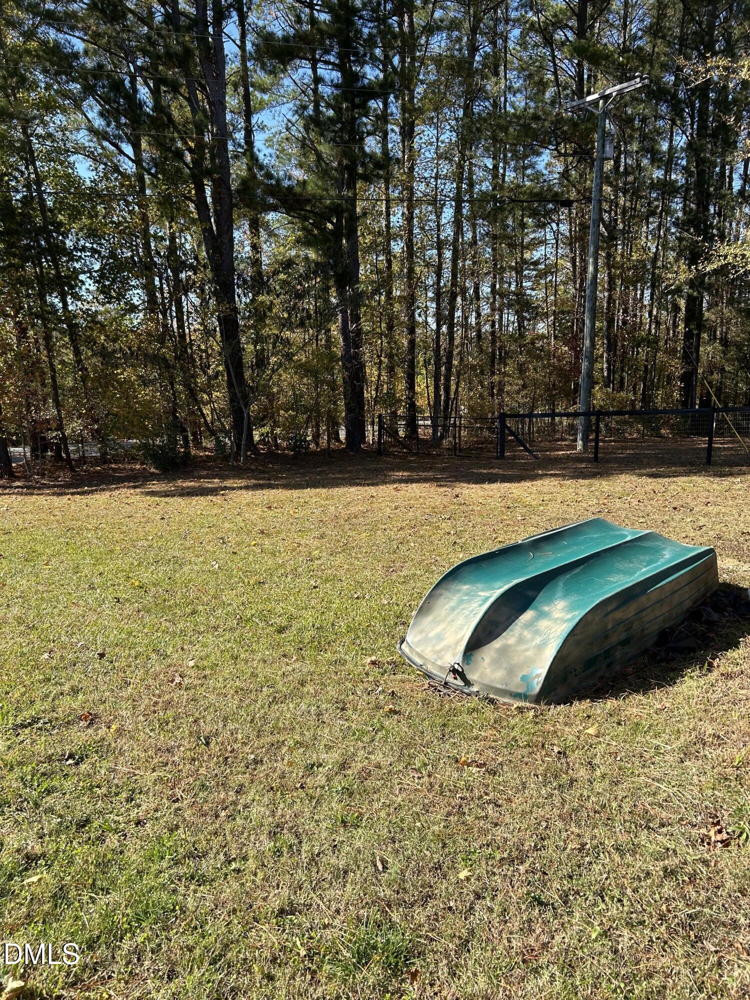 3105 Tump Wilkins Road Stem, NC 27581 - Photo 30 of 30 a view of a pool in a yard