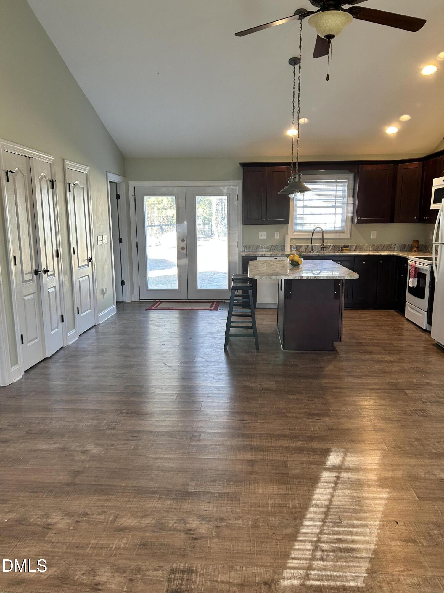 3105 Tump Wilkins Road Stem, NC 27581 - Photo 6 of 30 a view of a dining room with furniture