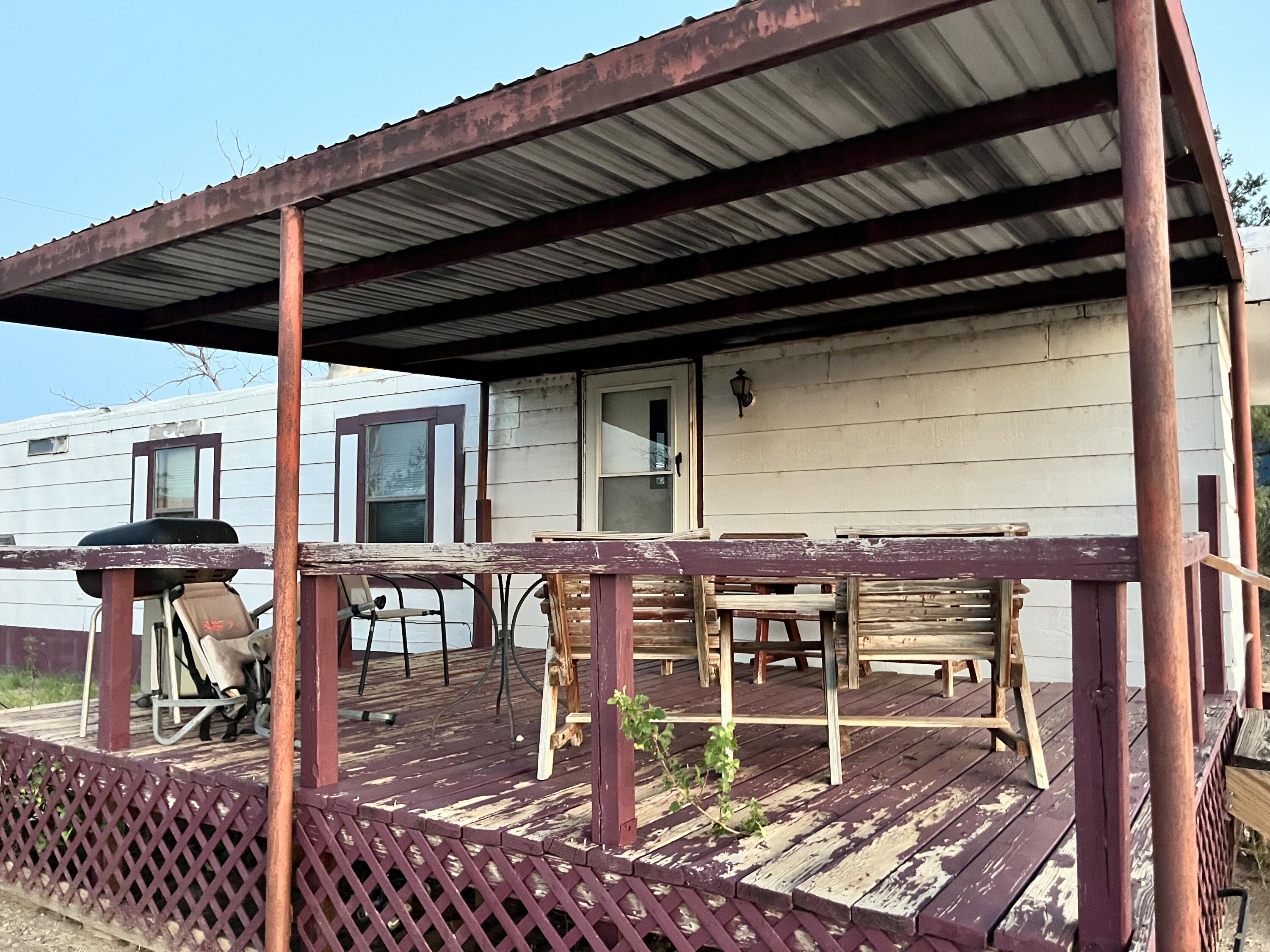 329 Spur Road Spur, TX 79370 - Photo 17 of 17 a front view of a house with glass windows