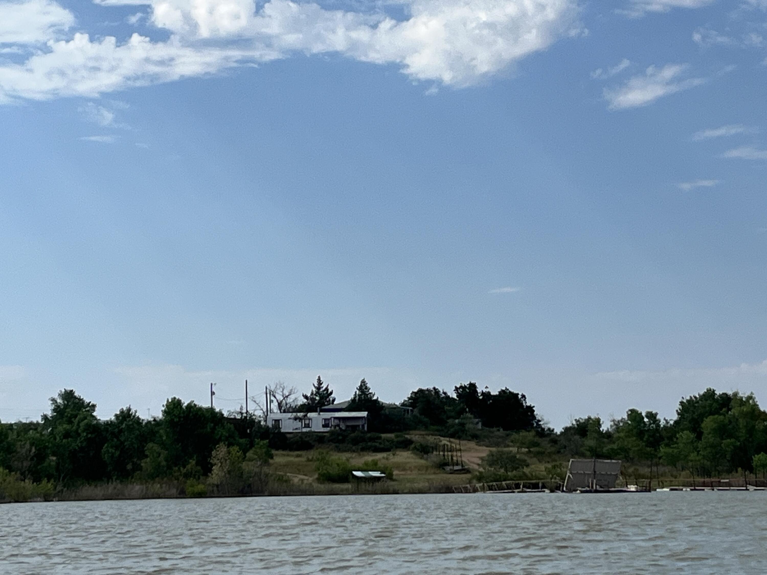 329 Spur Road Spur, TX 79370 - Photo 6 of 17 a view of ocean and trees