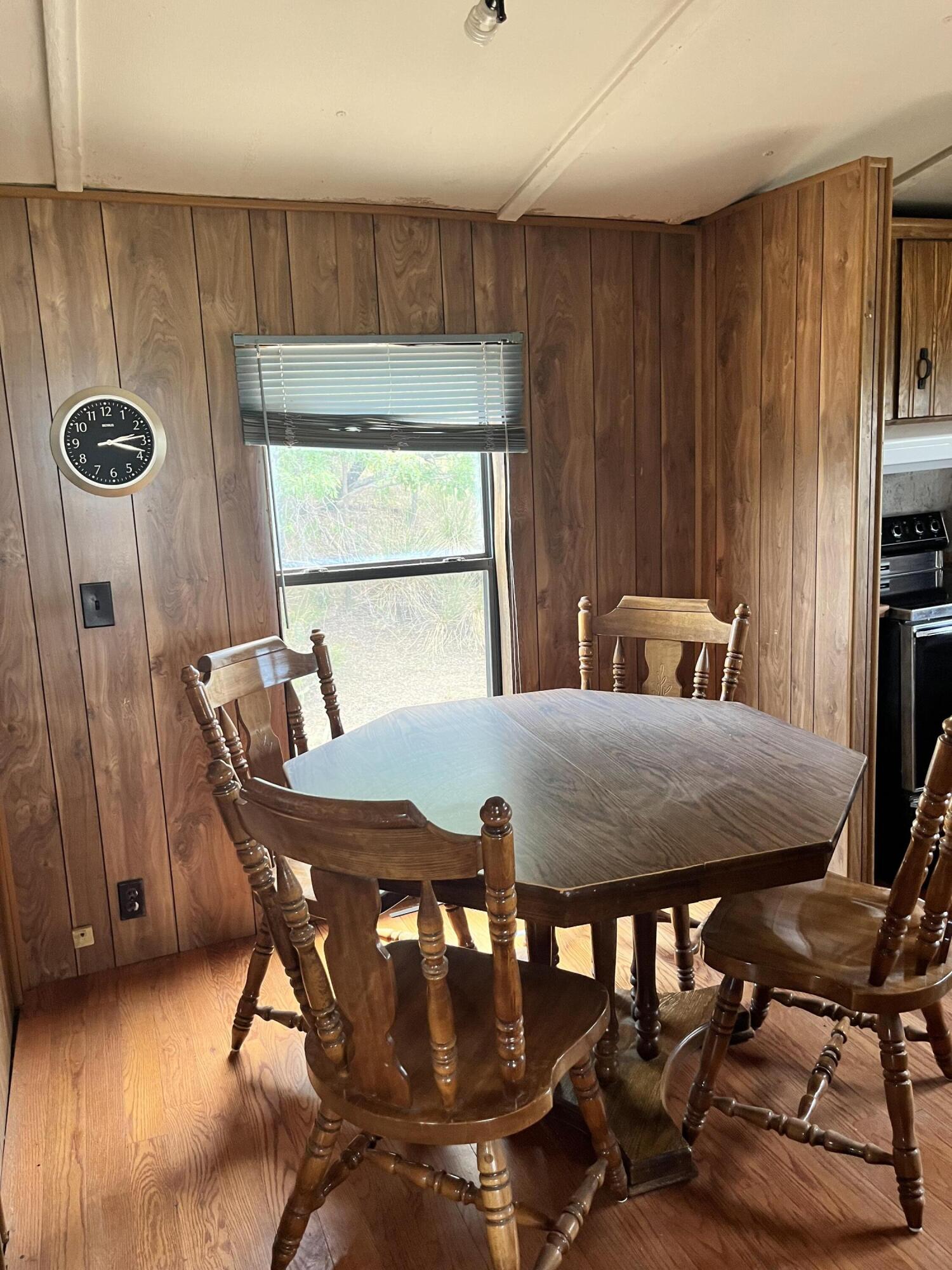 329 Spur Road Spur, TX 79370 - Photo 8 of 17 a dining room with furniture and window