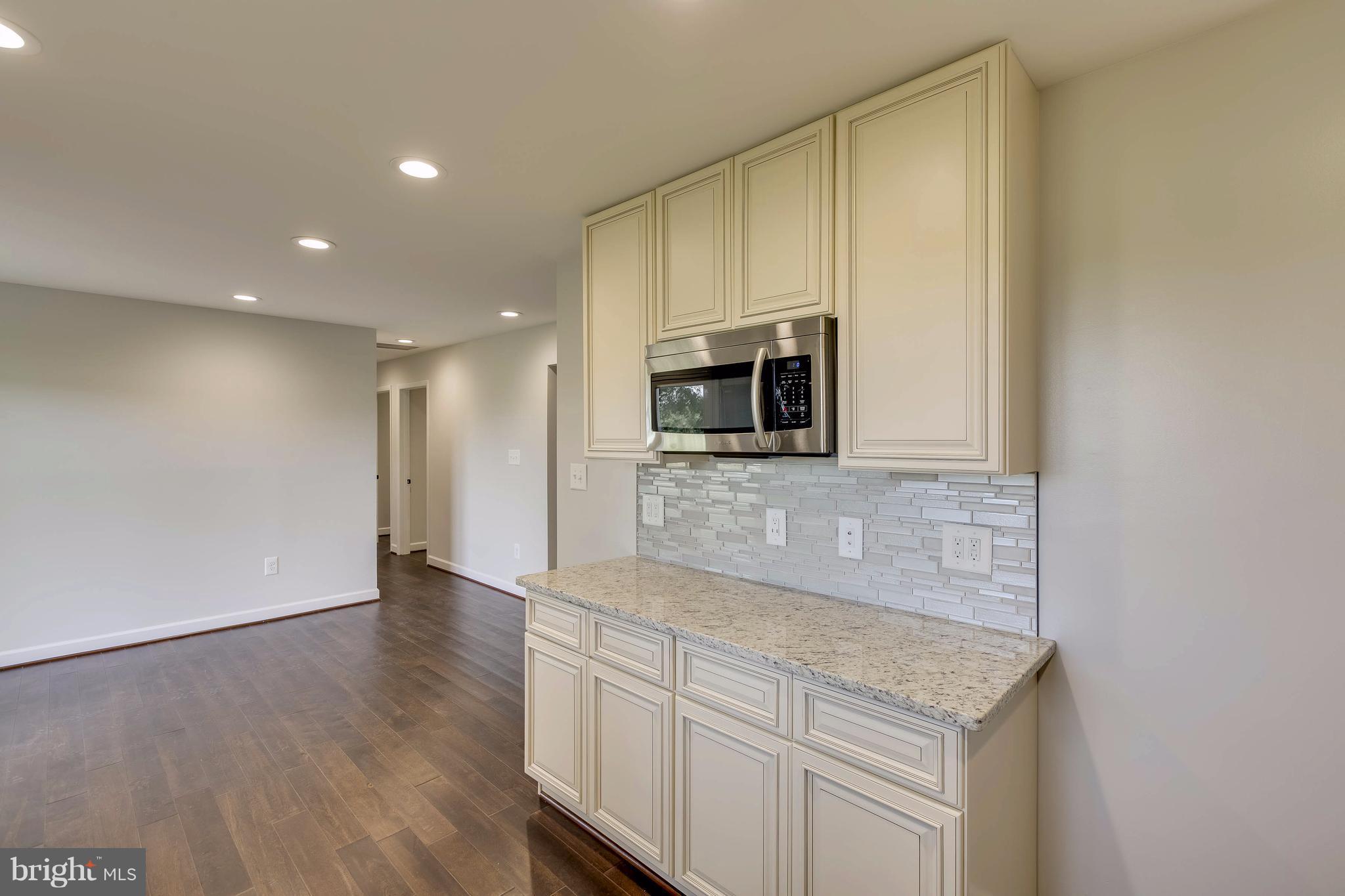 23435 Peach Tree Road Clarksburg, MD 20871 - Photo 10 of 26 a view of a kitchen with electric appliances