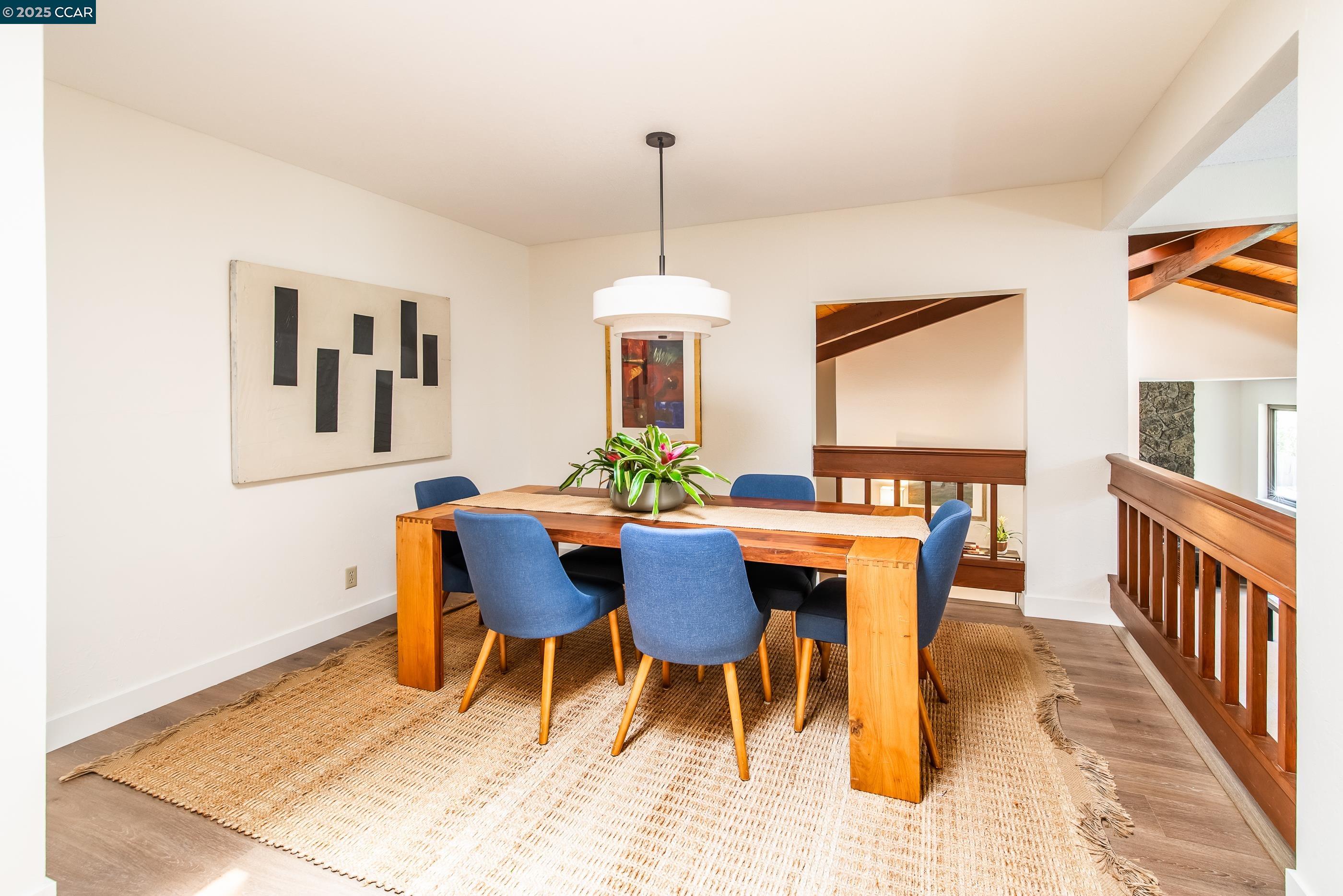 220 Devonshire Court Pleasant Hill, CA 94523 - Photo 13 of 47 a dining room with furniture a rug and a chandelier