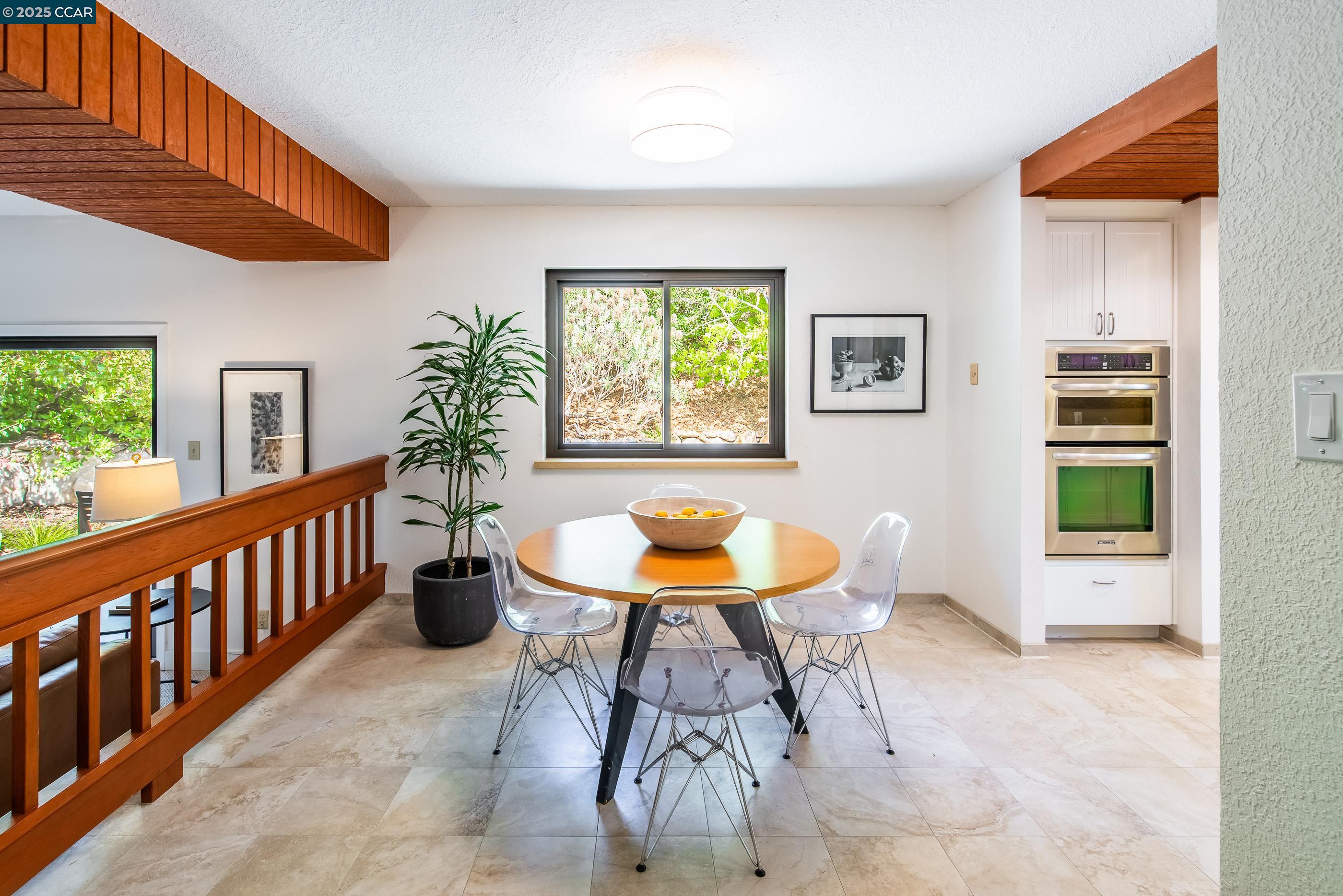 220 Devonshire Court Pleasant Hill, CA 94523 - Photo 15 of 47 a view of a dining room with furniture window and wooden floor