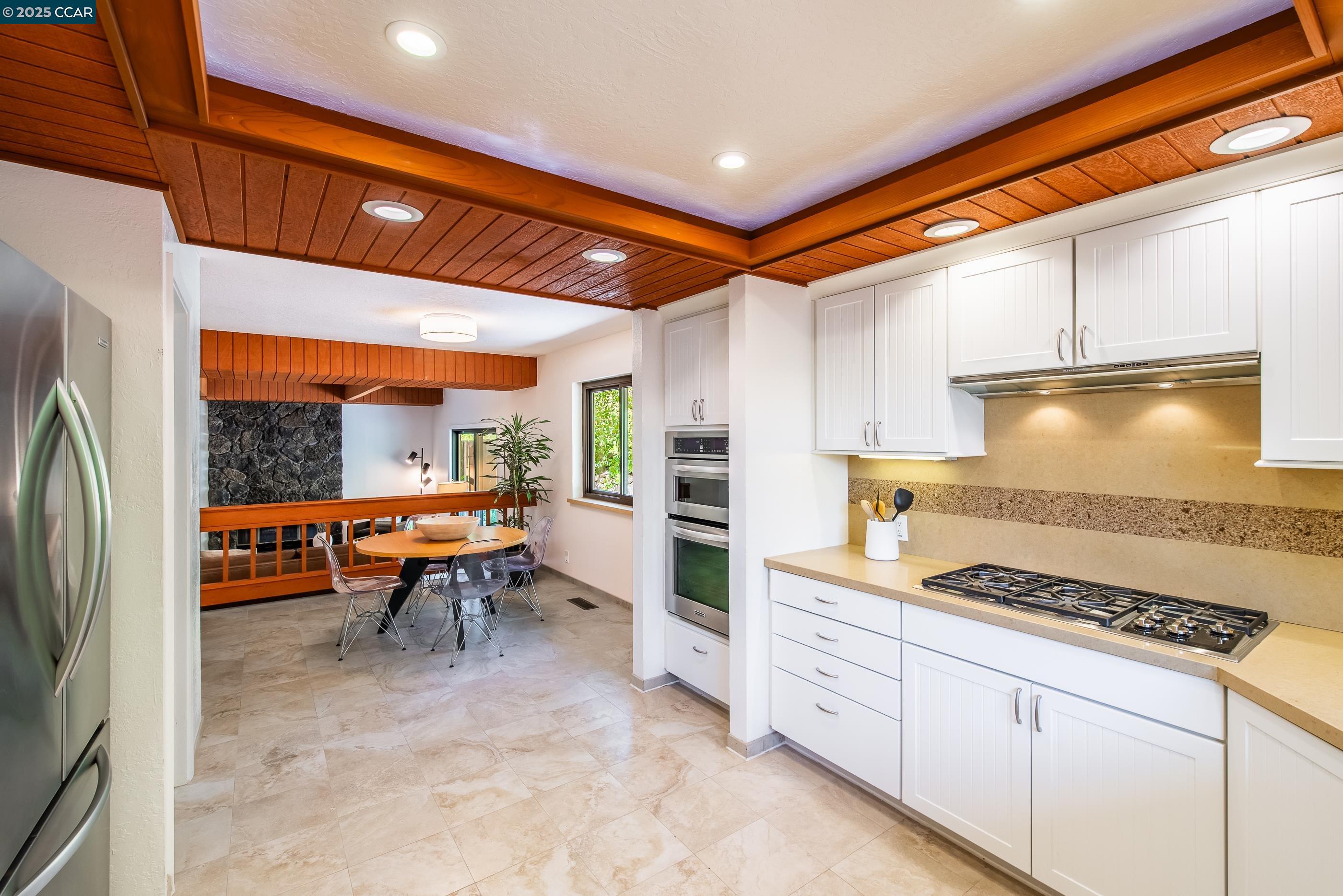 220 Devonshire Court Pleasant Hill, CA 94523 - Photo 21 of 47 a kitchen with table and chairs in it