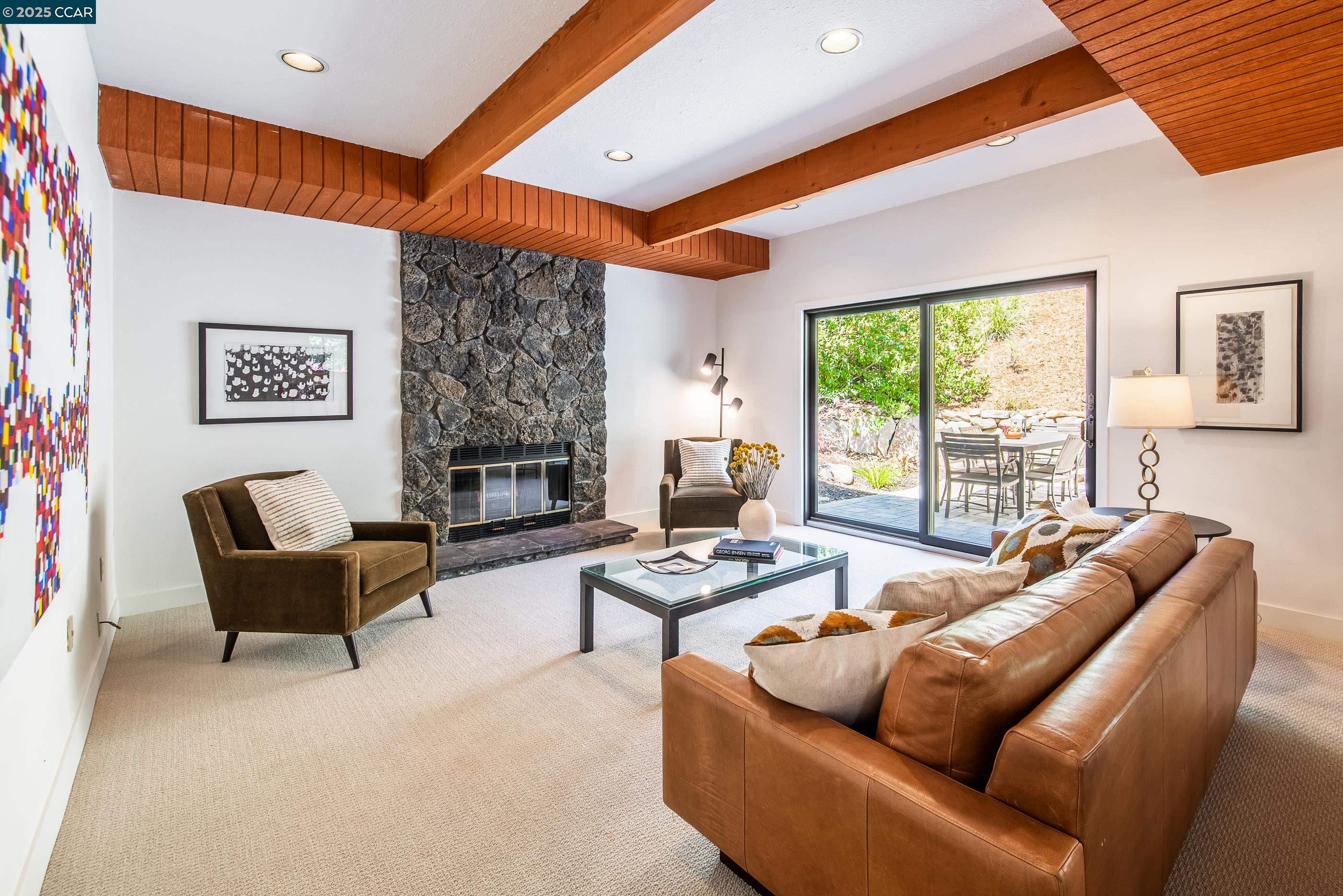 220 Devonshire Court Pleasant Hill, CA 94523 - Photo 24 of 47 a living room with furniture and a fireplace