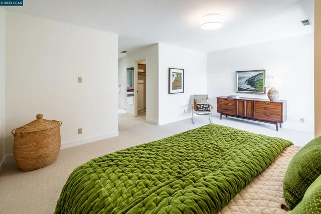 a room with furniture and a window