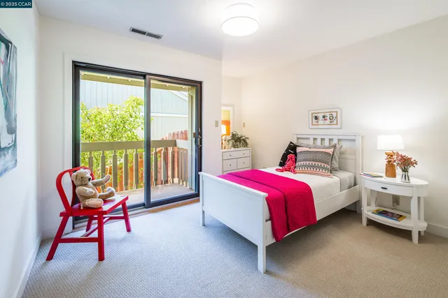 a view of a backyard with sitting area