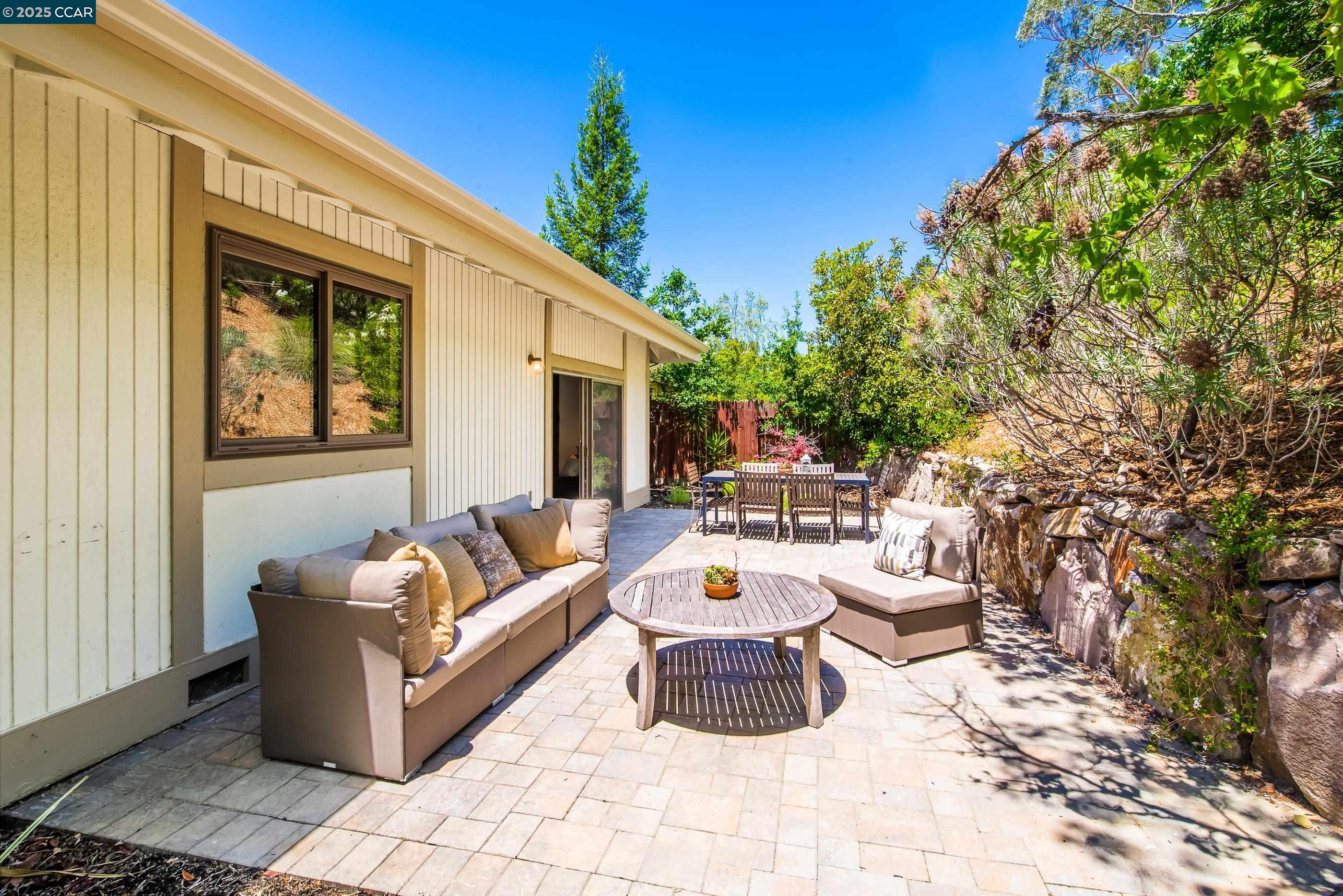 220 Devonshire Court Pleasant Hill, CA 94523 - Photo 40 of 47 a view of a patio with couches and potted plants