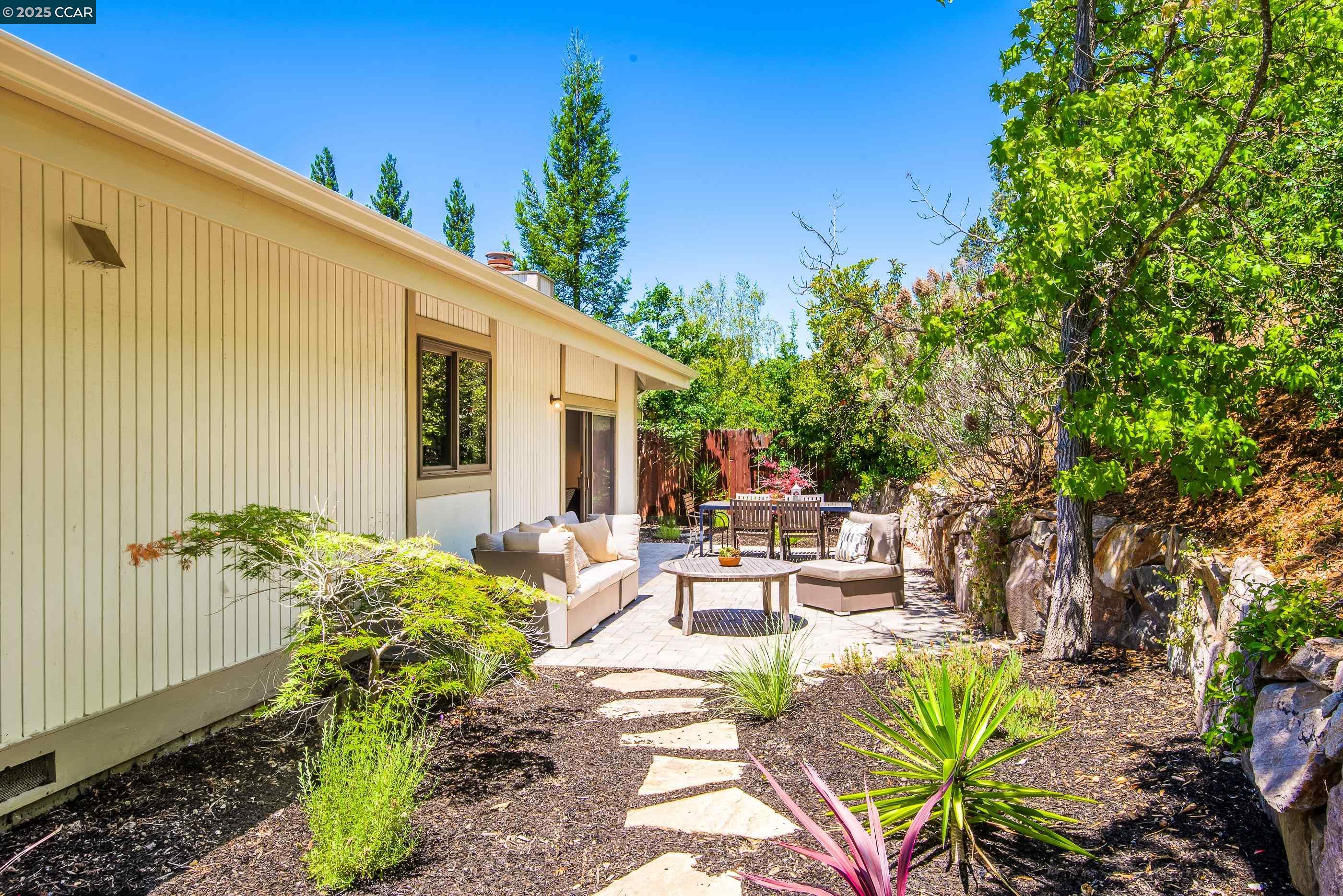 220 Devonshire Court Pleasant Hill, CA 94523 - Photo 41 of 47 a view of a patio with couches table and chairs and potted plants