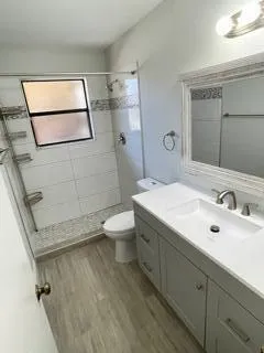 a bathroom with a sink and mirror