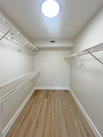 a view of a room with racks on the wall