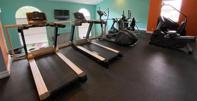a view of a room with gym equipment