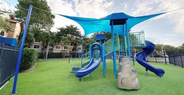 a view of a park with slide