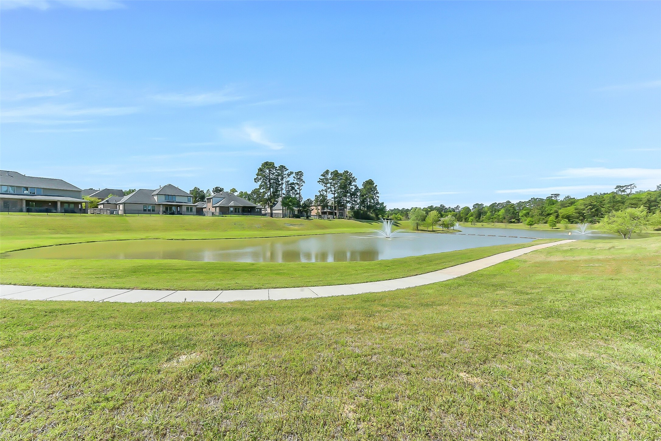 4903 Lagos Lagoon Way Spring, TX 77389 - Photo 43 of 49 Lake trail that leads to the greenery.