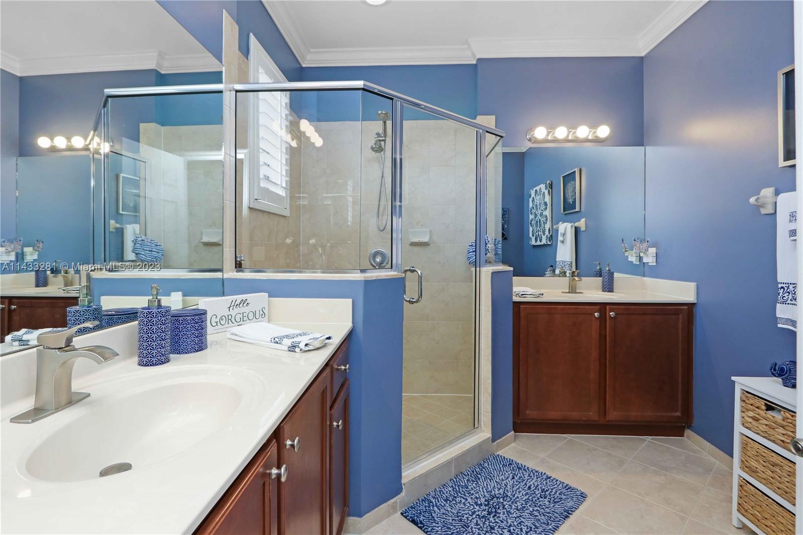 11363 Southwest 240th Street Homestead, FL 33032 - Photo 17 of 39 a bathroom with a sink and a mirror