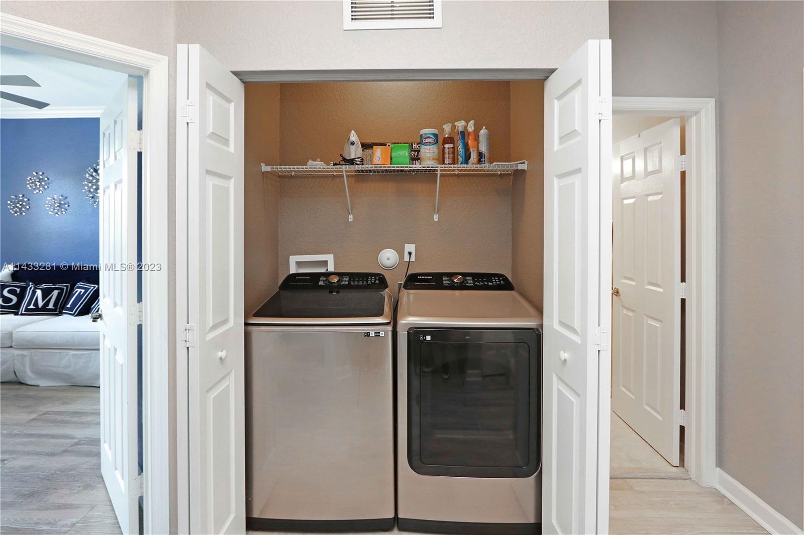 11363 Southwest 240th Street Homestead, FL 33032 - Photo 24 of 39 a utility room with washer and dryer