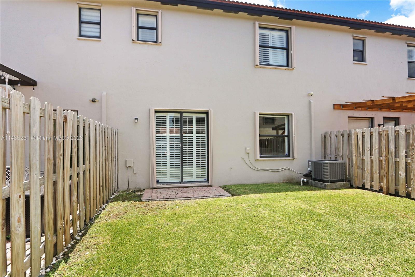 11363 Southwest 240th Street Homestead, FL 33032 - Photo 26 of 39 a view of an entrance of the house