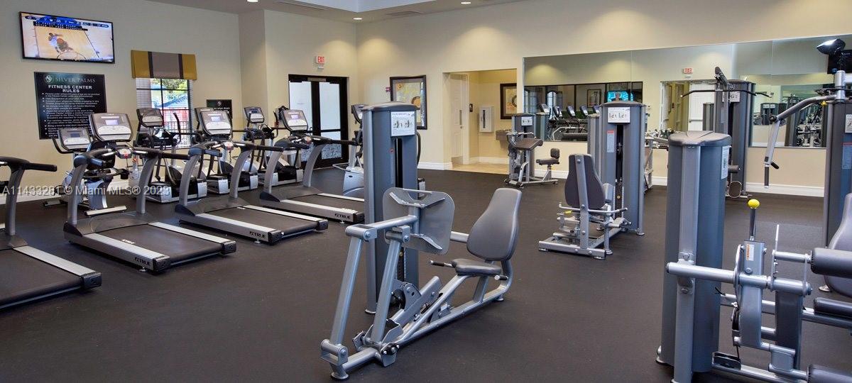 11363 Southwest 240th Street Homestead, FL 33032 - Photo 36 of 39 a view of a room with gym equipment